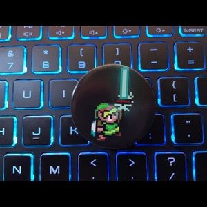 Retro Legend of Zelda in 8 bit mobile phone grips